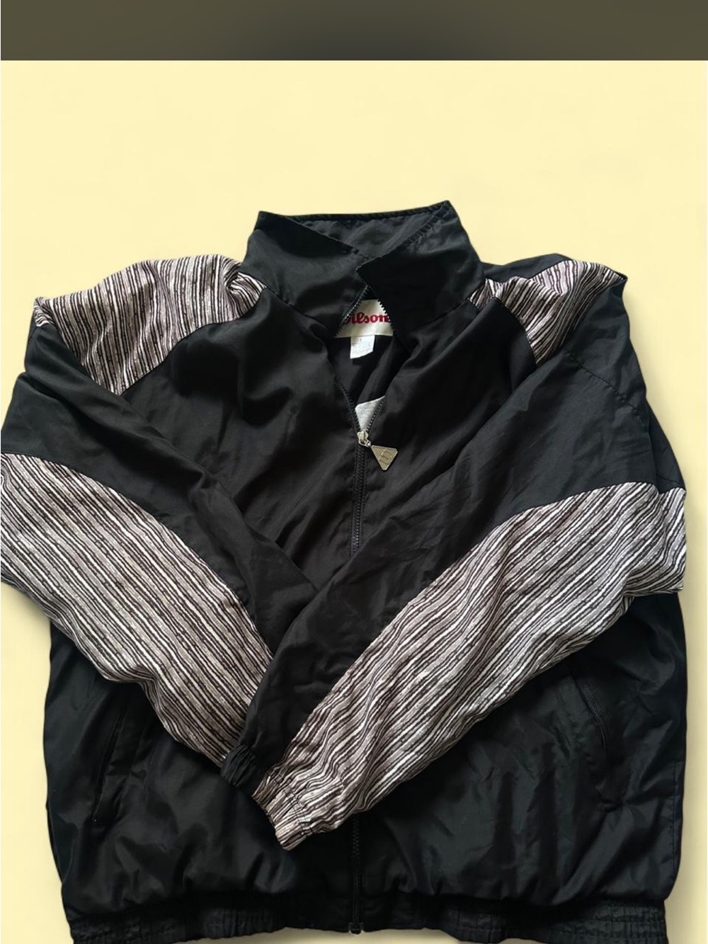 Wilson Black Bomber Jacket with Striped Gray Accent Sleeves